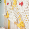 Une tête de lit macramé pour une chambre à l'esprit bohème