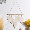 Macramé mural plume blanche